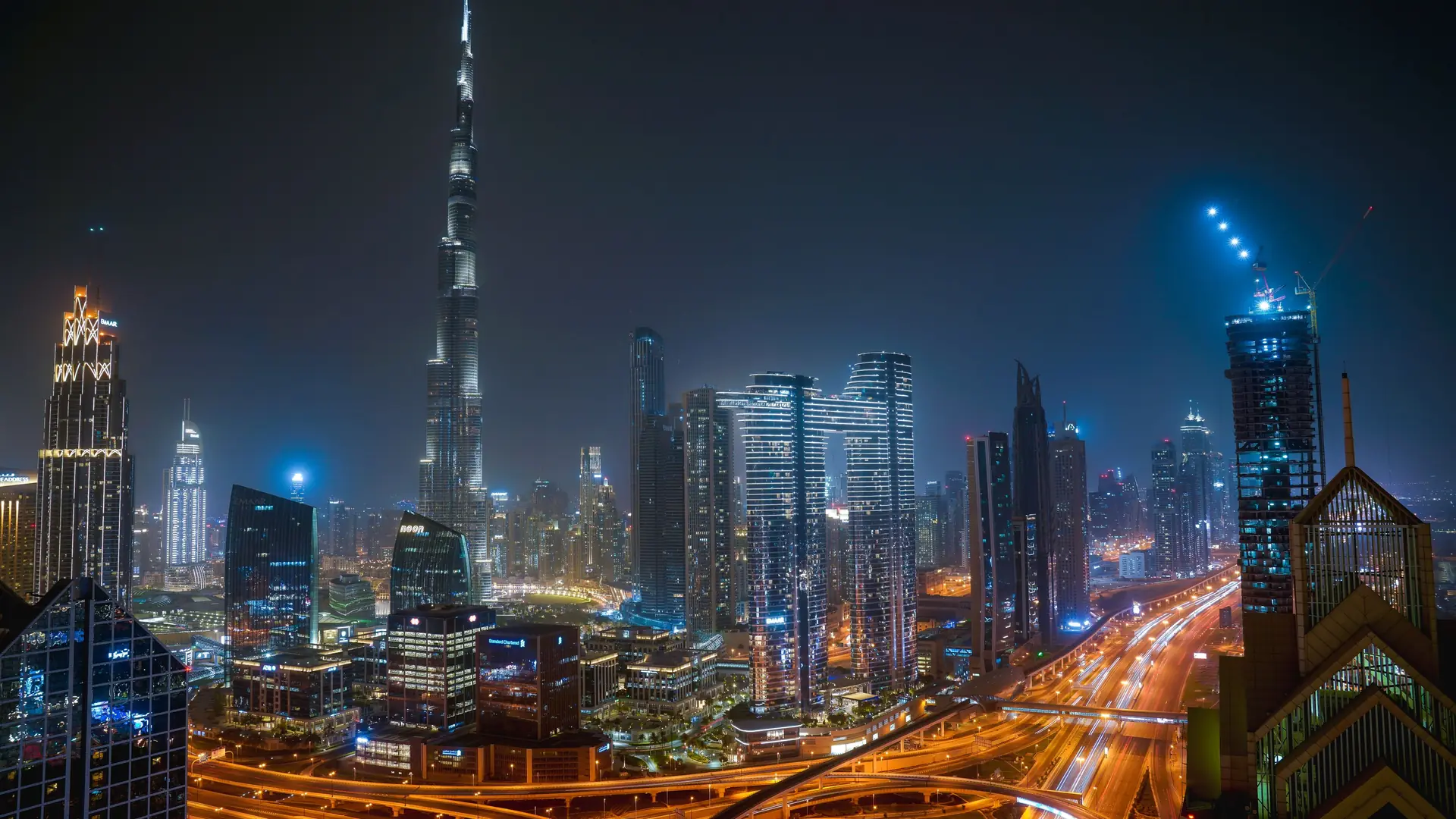 Downtown Dubai at night: the Burj Khalifa above Sheikh Zayed Road
