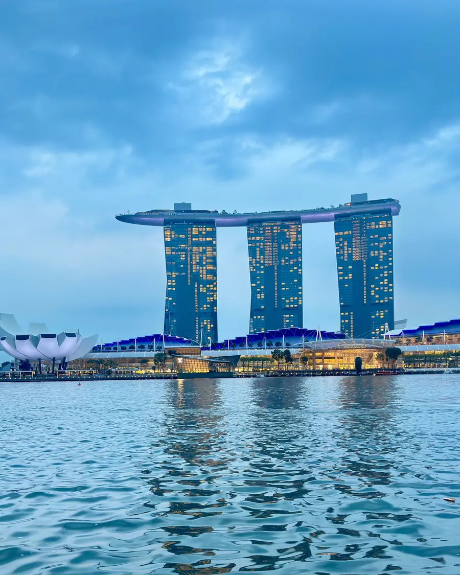 Marina Bay Sands and the ArtScience Museum across the water at dusk, Singapore